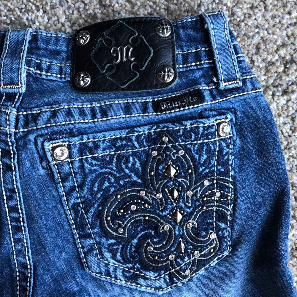 Miss Me skinny jeans fleur de lis studded jeans